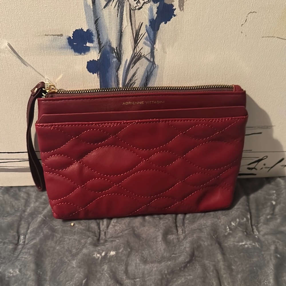 Adrienne Vittadini maroon clutch/ wrislet
